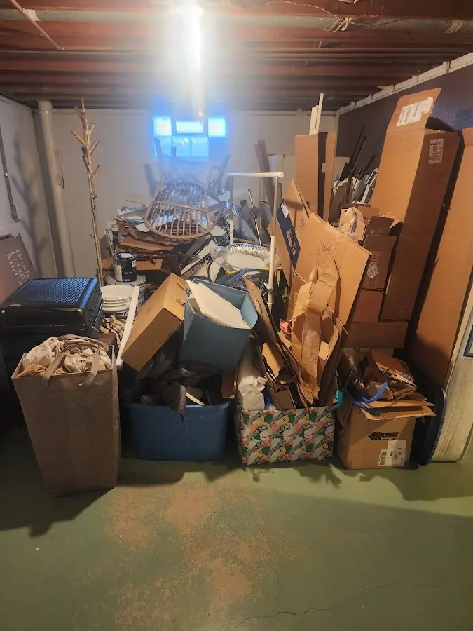 Roll-off dumpster container at job site for 2 Yard Dumpster Rental in Dalton